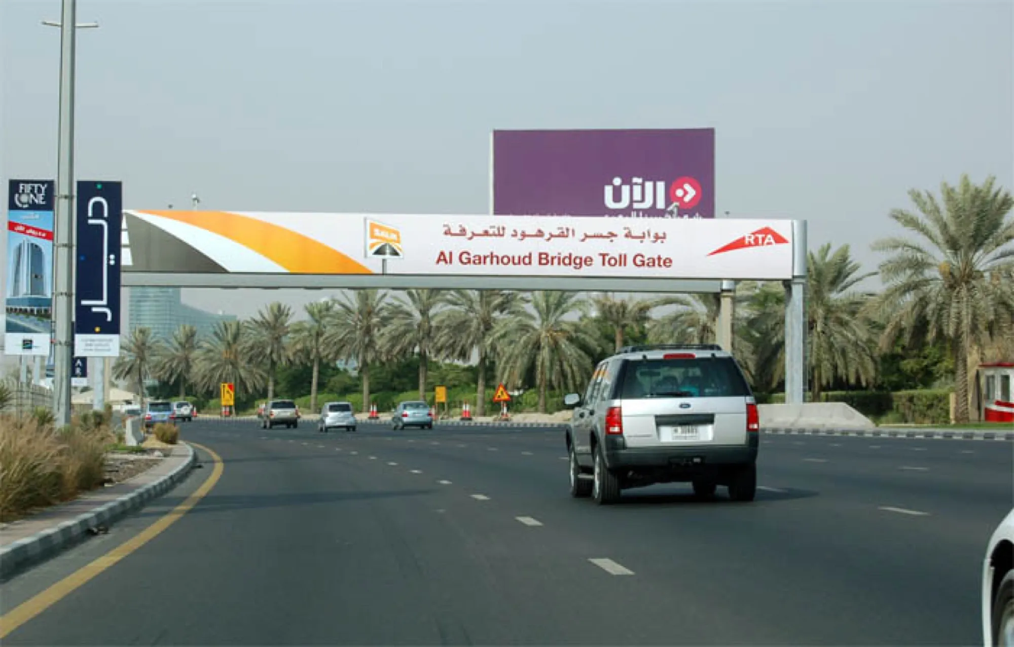 The Salik gantry marked Al Garhoud Bridge Toll Gate over the road approaching the bridge, photographed in 2007