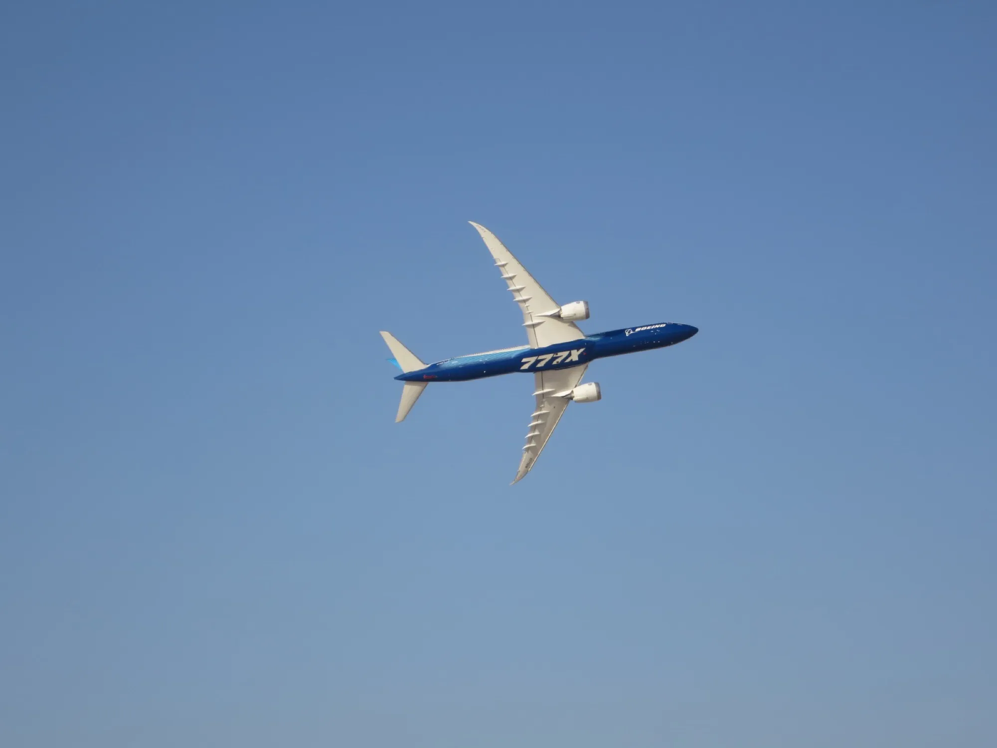 A Boeing 777X in a flying display at the Dubai Airshow 2023
