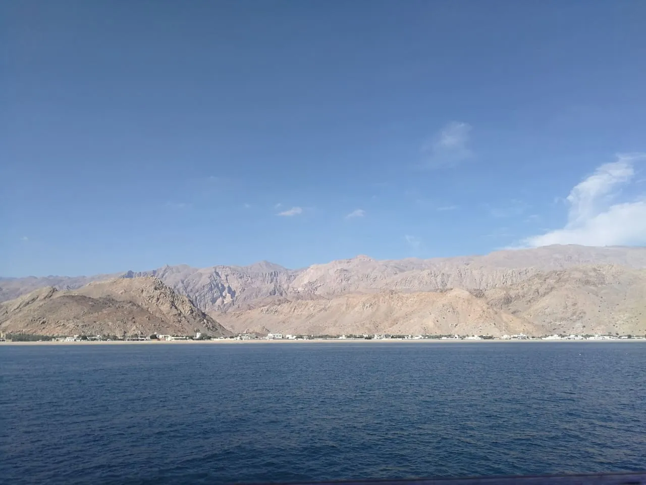 The coastline and mountains of Dibba Al-Bayah, the Omani side of Dibba, seen from the sea