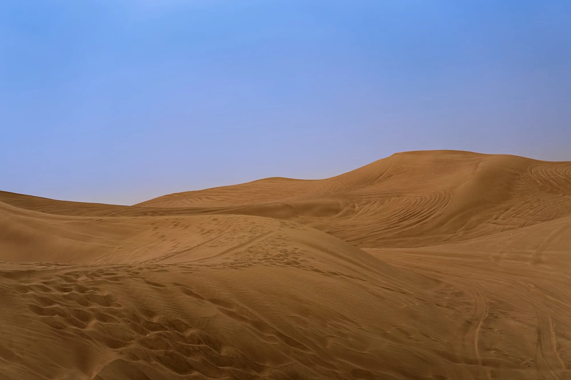 Red sand dunes in the desert outside Dubai
