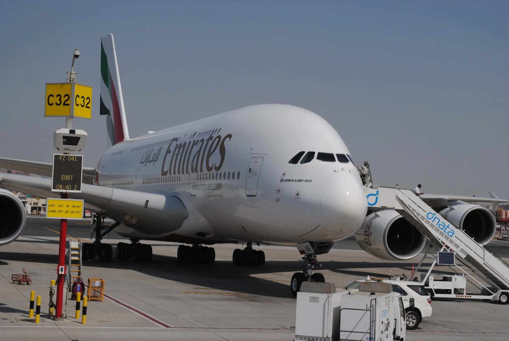 An Emirates Airbus A380 parked at stand C32 at Dubai International Airport