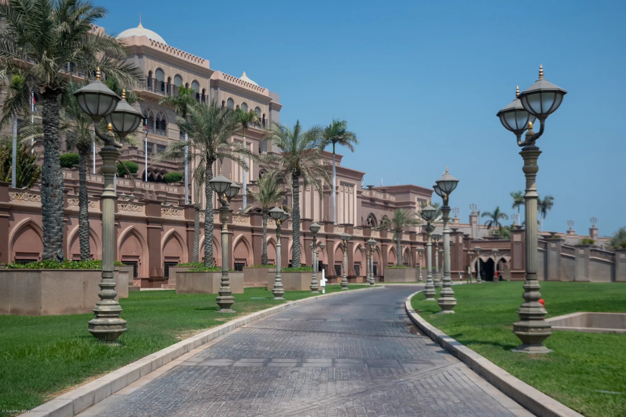 The palm-lined driveway to Emirates Palace in Abu Dhabi