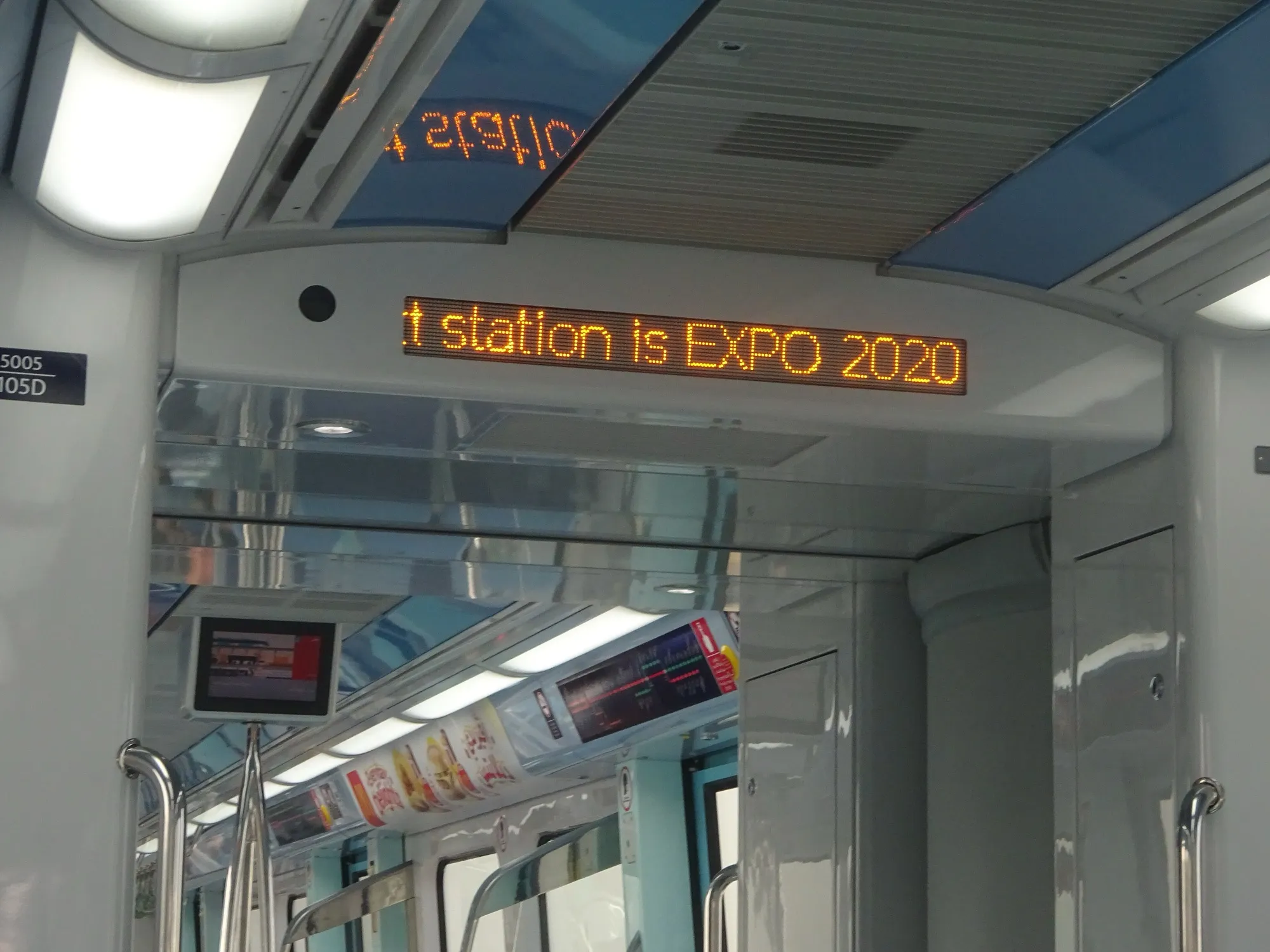 A Red Line train display showing the next station as Expo 2020