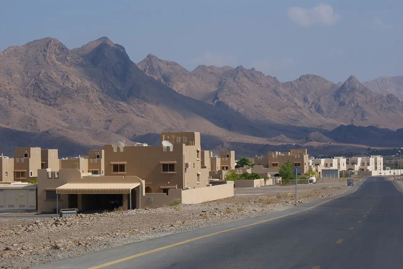 A road through Hatta, the Dubai town in the Hajar Mountains where cars leave the UAE for the Al Wajajah border