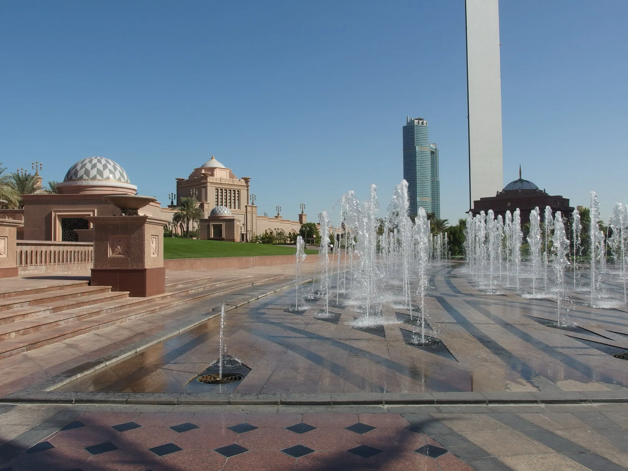 Fountains and pink stone domes in the grounds of Emirates Palace, Abu Dhabi