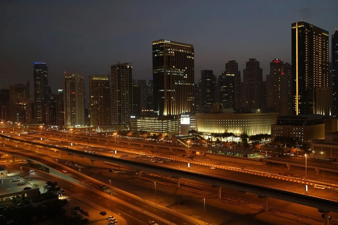 Sheikh Zayed Road and the Dubai Marina towers at night, seen from Jumeirah Lakes Towers
