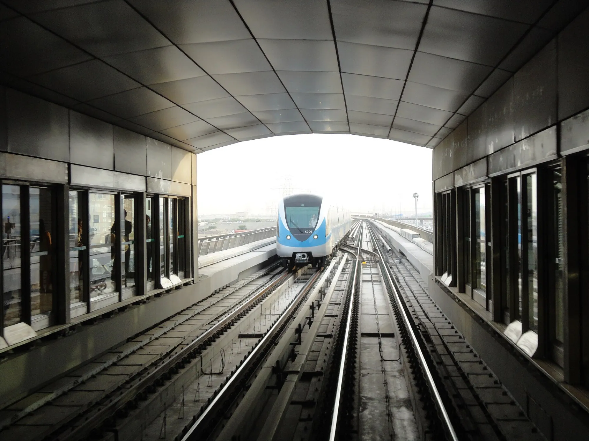 A Dubai Metro train approaching a station on the Red Line