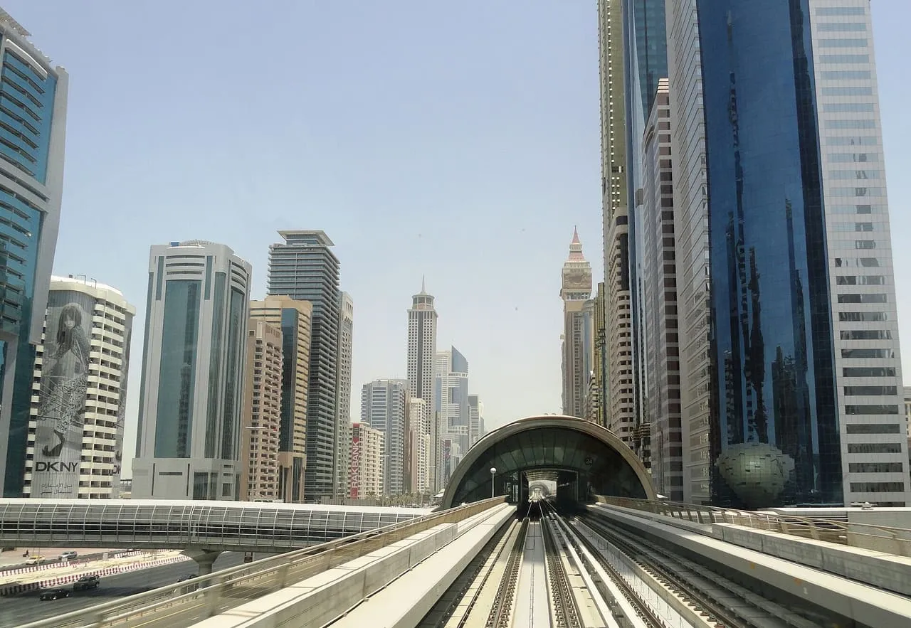 A Dubai Metro viaduct running between the towers along Sheikh Zayed Road