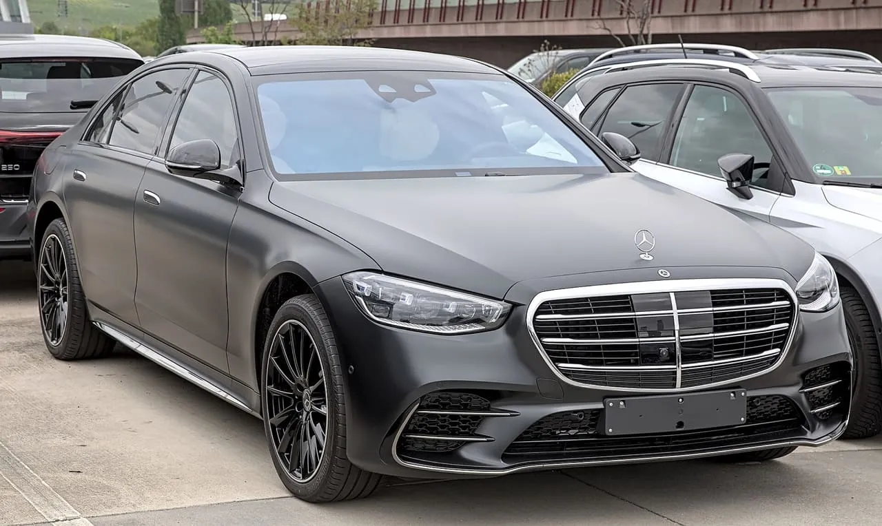 A matt grey Mercedes-Benz S 580 4MATIC, the current S-Class, parked in a car park