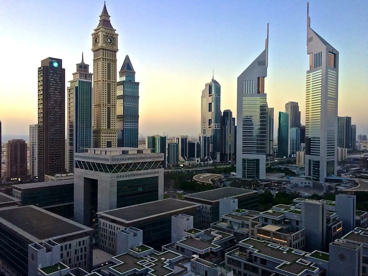 The Gate building at DIFC and the Emirates Towers on Sheikh Zayed Road, Dubai, at dawn