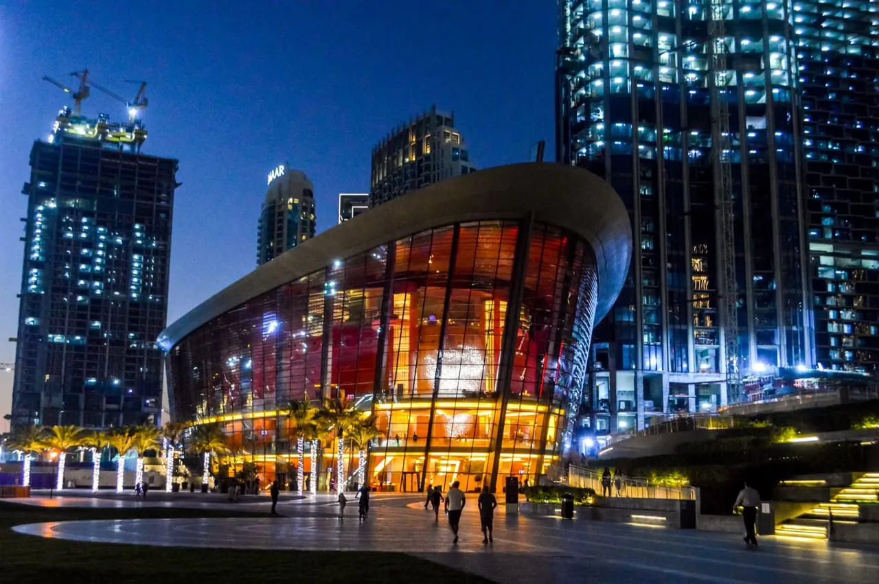 Dubai Opera lit up at night on Opera Plaza in Downtown Dubai