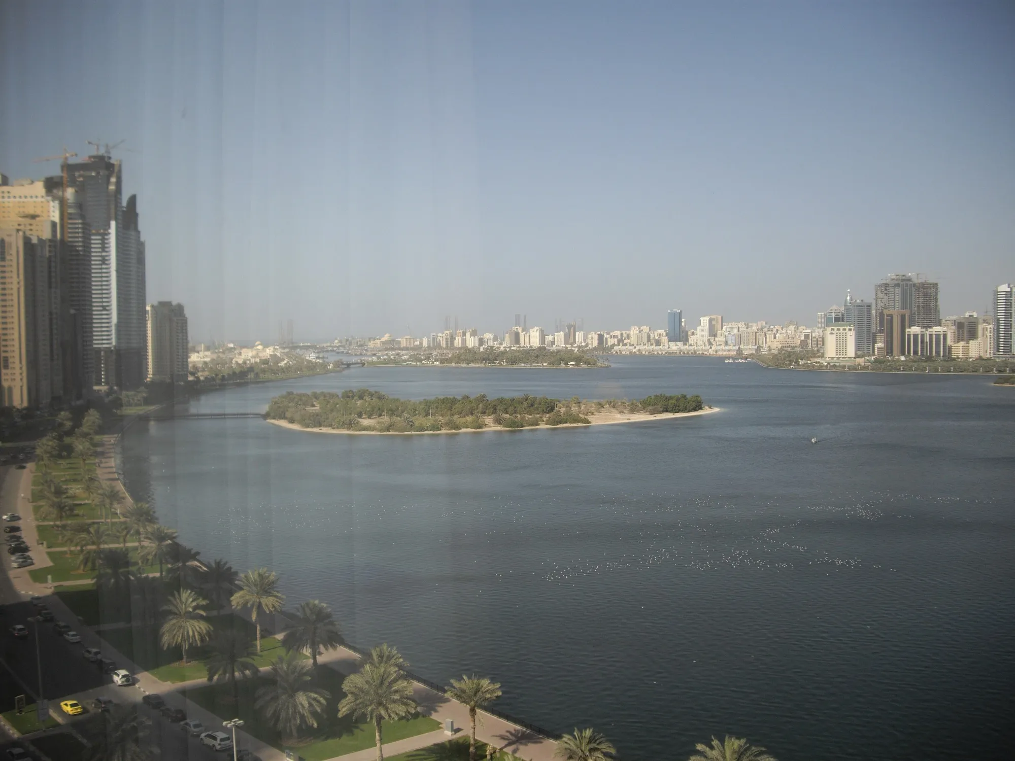 The Sharjah waterfront and city skyline across the water