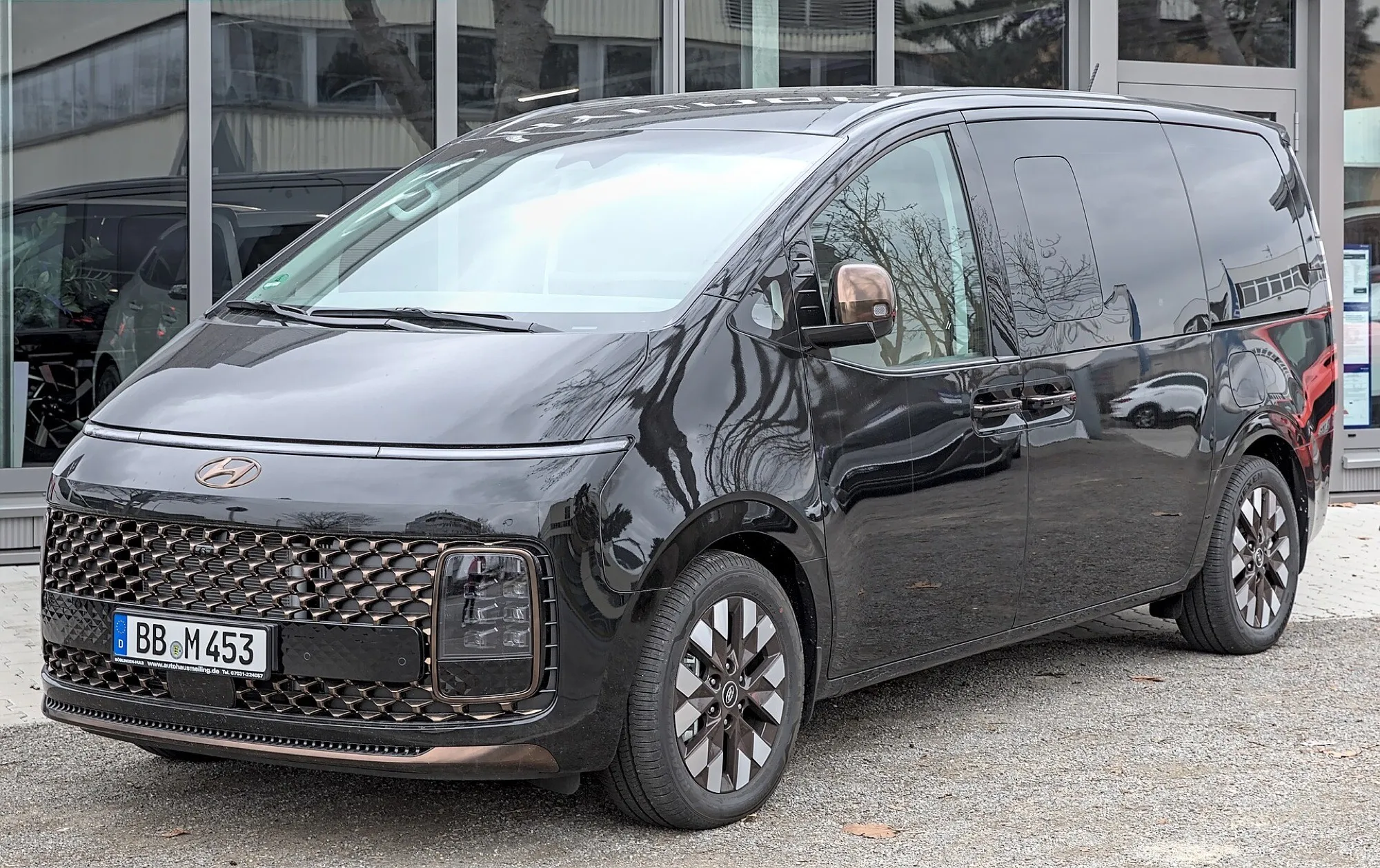 A black Hyundai Staria people mover with a sliding side door