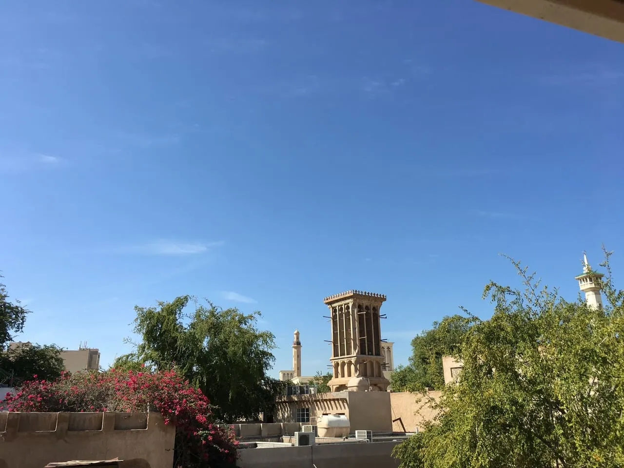 A traditional wind tower above the houses of the Al Fahidi Historical Neighbourhood in Bur Dubai