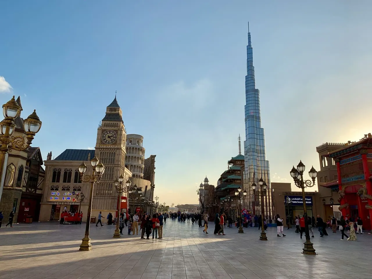 A walkway at Global Village lined with replicas of Big Ben and the Burj Khalifa