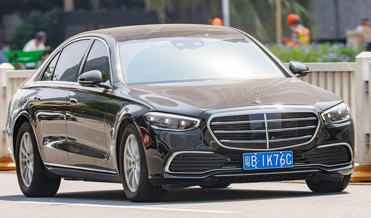A dark Mercedes-Benz S-Class saloon of the current W223 generation