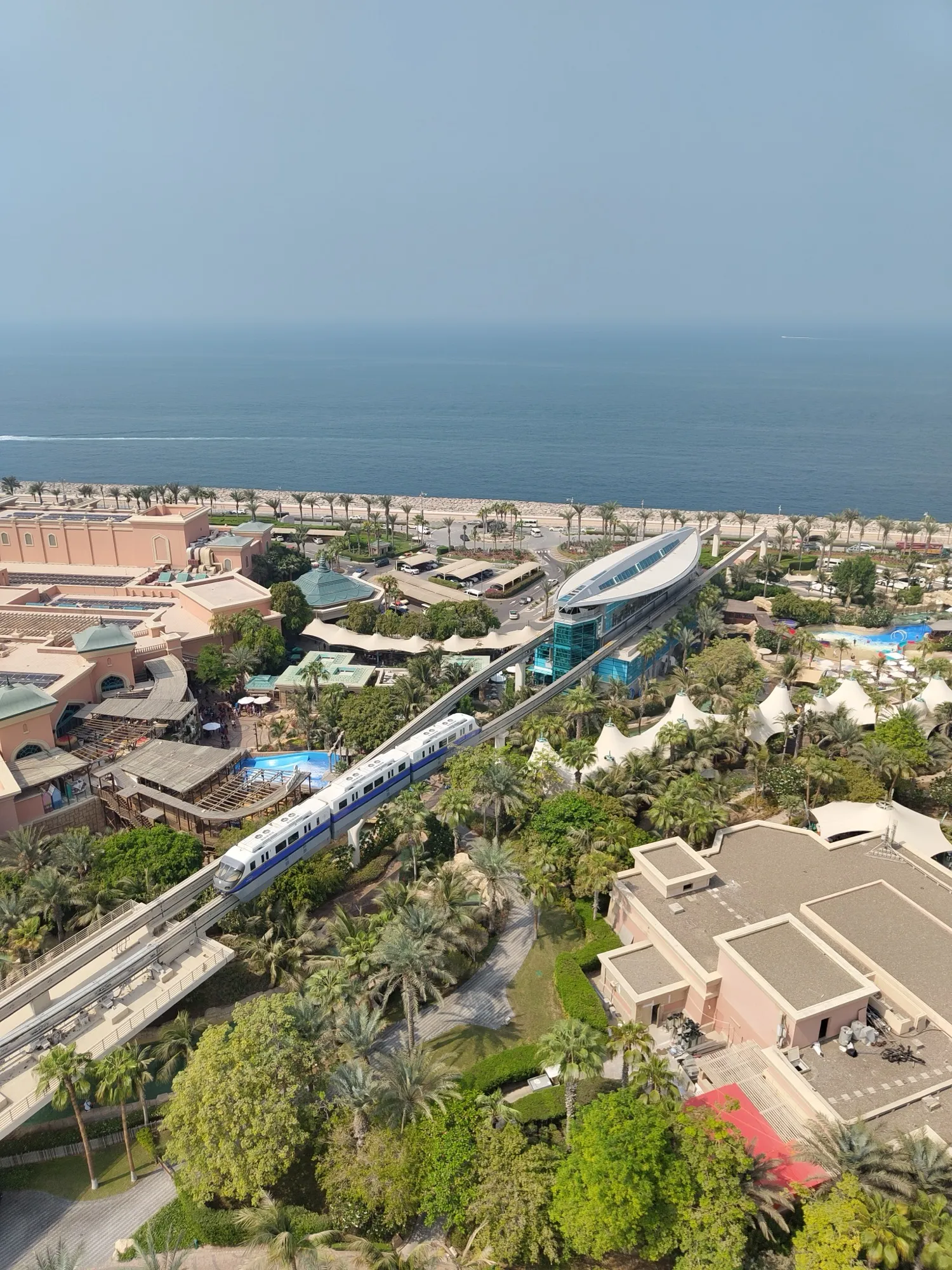 The Palm Jumeirah Monorail running through the Atlantis resort grounds toward its terminal station