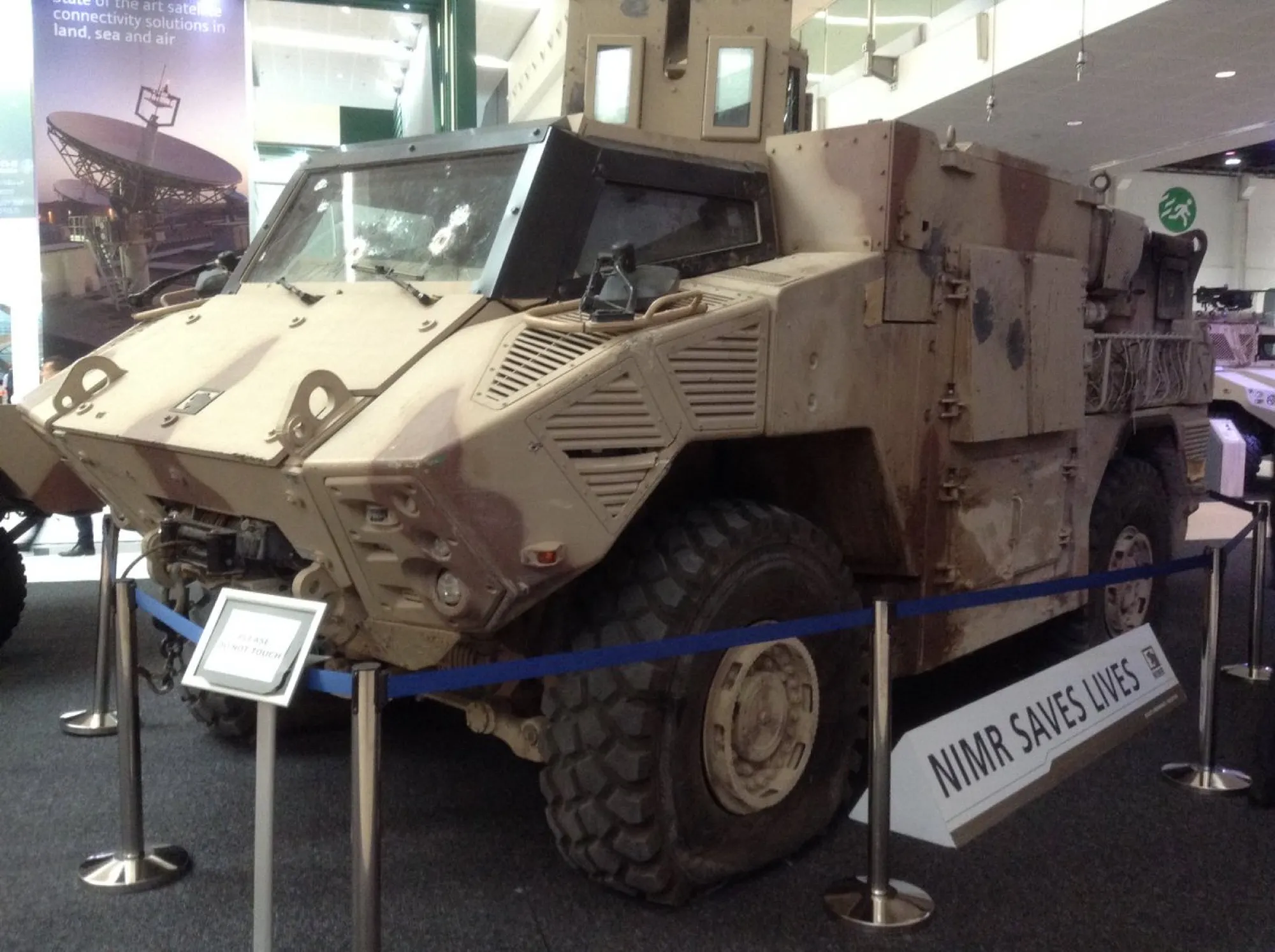 A NIMR JAIS armoured vehicle on display inside a hall at IDEX 2017 in Abu Dhabi
