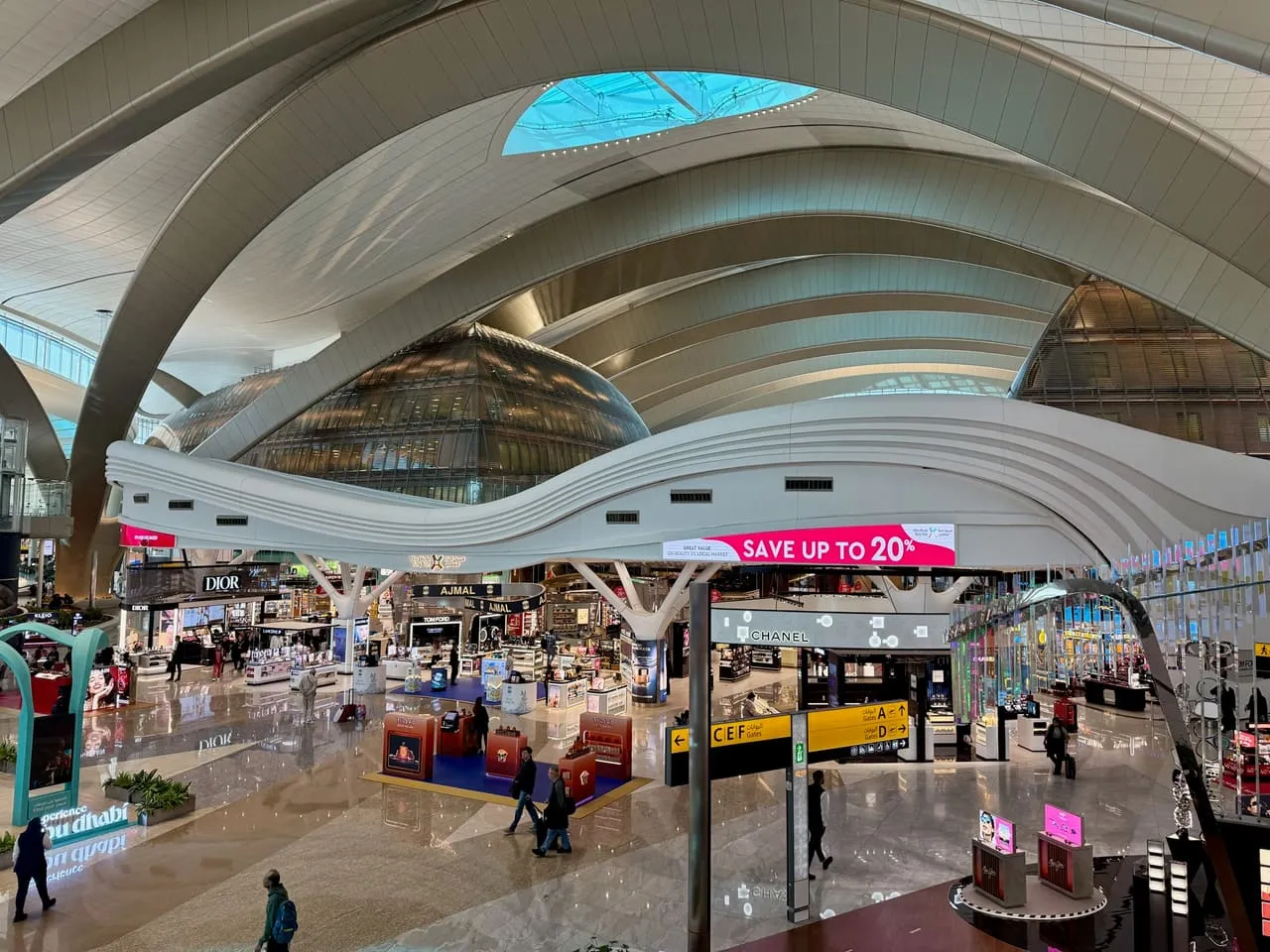 Duty-free hall under the curved roof of Terminal A at Zayed International Airport, Abu Dhabi